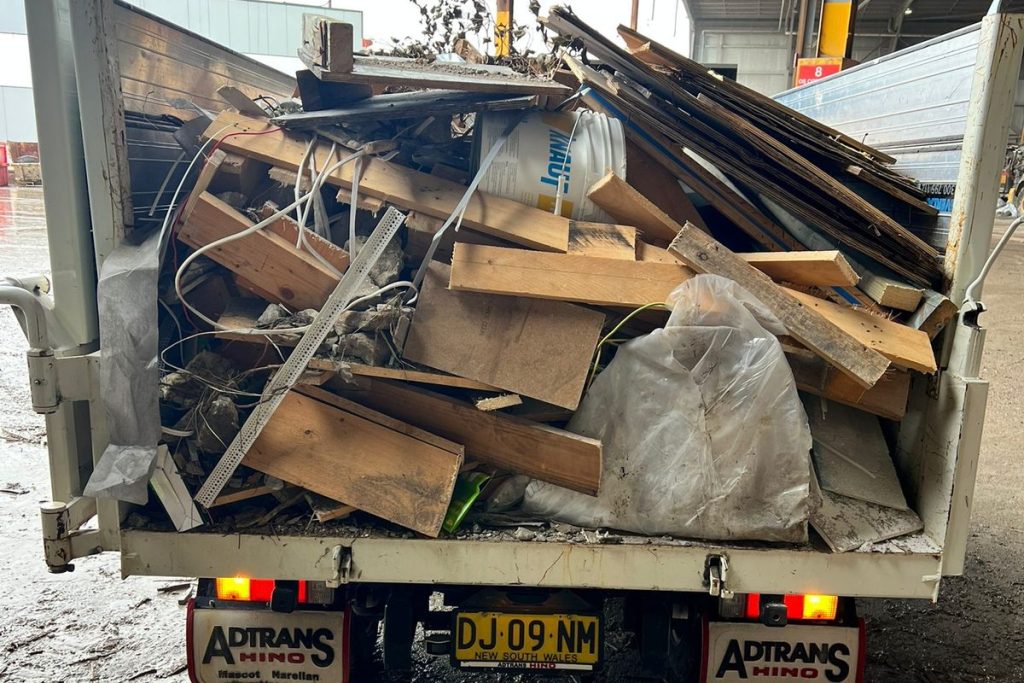 Rubbish Runners truck loaded with timber and building waste