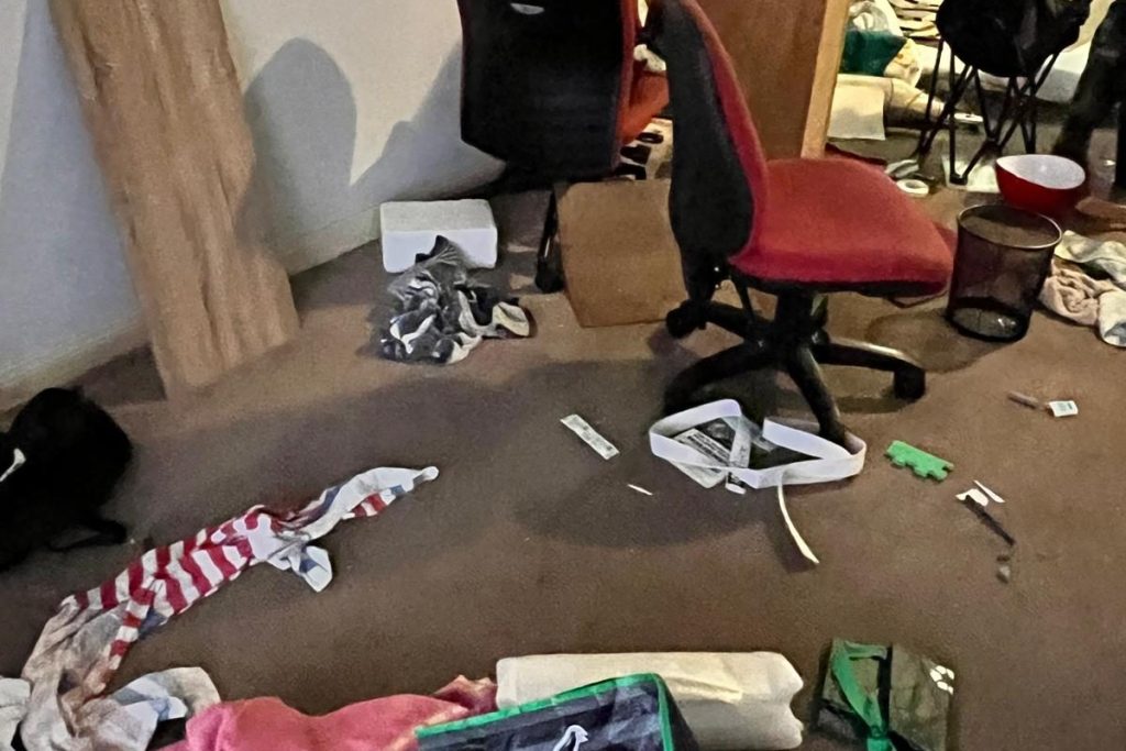 Rubbish and furniture left behind in a rental after the tenant moved out